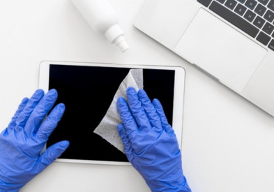 iPad repair Dubai – Al Barsha Electronics technician repairing iPad screen